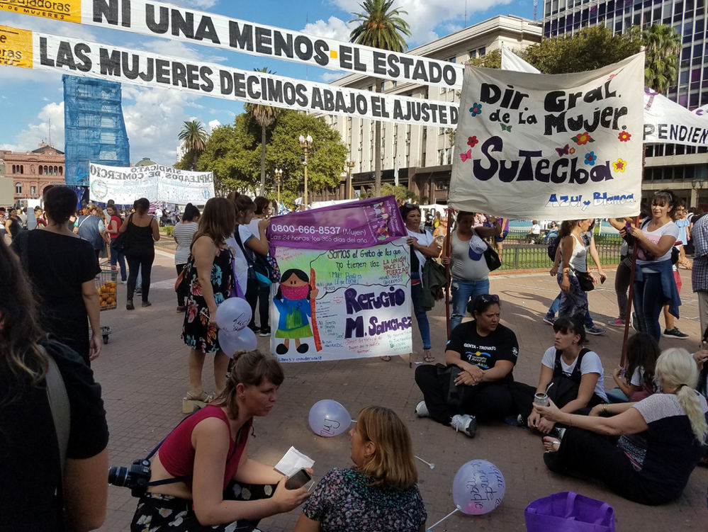 Women's march in Buenos Aires, Argentina. Femicide remains an issue for Argentina, where NGOs estimate domestic violence kills to reach a woman daily. Photo by: Carolyn Conte.