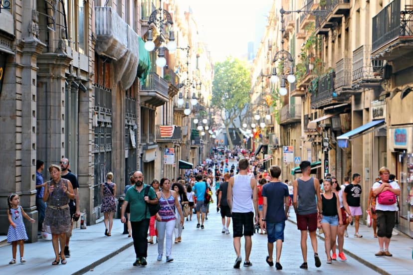 Tourists in Barcelona Gothic quarter.