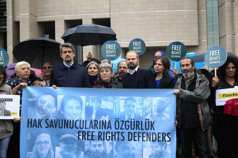 Turkey: Human rights activists protest on 25 October 2017. Photo by: Lefteris Pitarakis, AP.