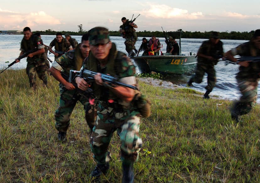 Peruvian Marines conduct a beach assault during field training along the Amazon River. Photo by: U.S. Navy photo by Chief Journalist Dave Fliesen.