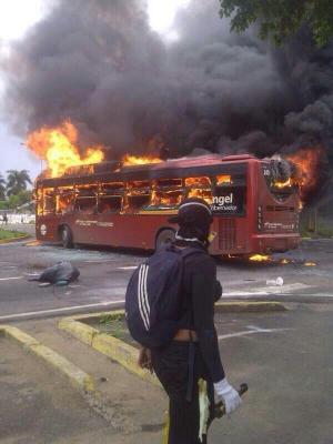 Venezuelan bus burnt by guarimberos.