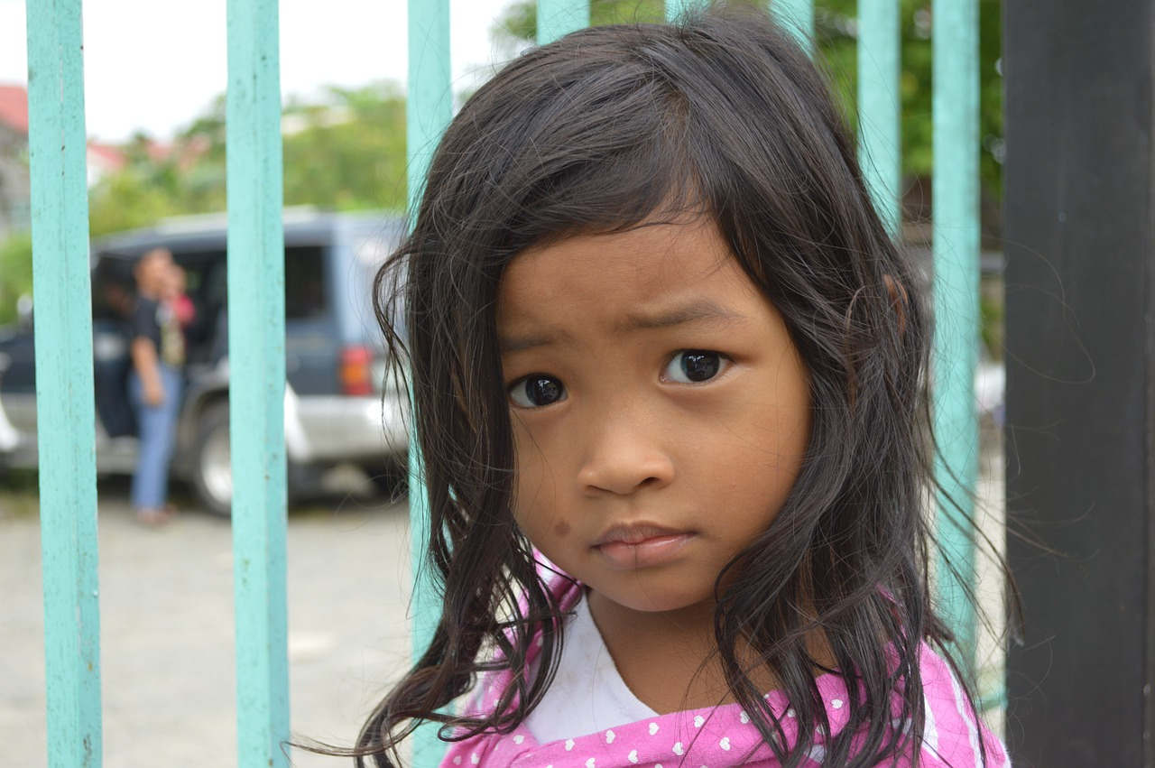 Sad Filipino girl. Photo by: Gonzales Earnest.