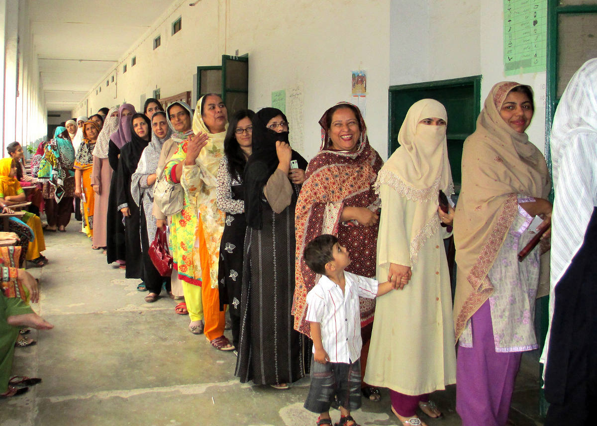 Women from Rawalpindi queued to vote for Pakistan's elections. Photo by: Rachel Clayton/Department for International Development.