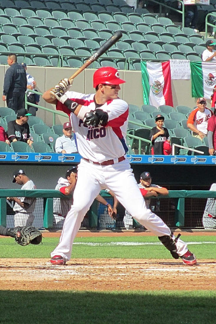 Aaron Bates playing for Team Puerto Rico hitting against the Dominican Republic at 2013 Serie del Caribe. Photo by: TooMuchInfo24.