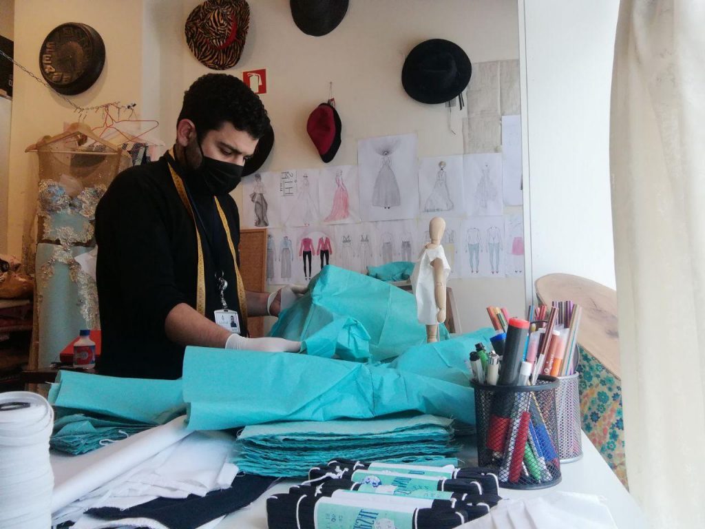 Ismail has been making protective covers for healthcare professionals caring for COVID-19 patients at Hospital de Dona Estefânia. (Photo credit: Casa de Moda Boali)